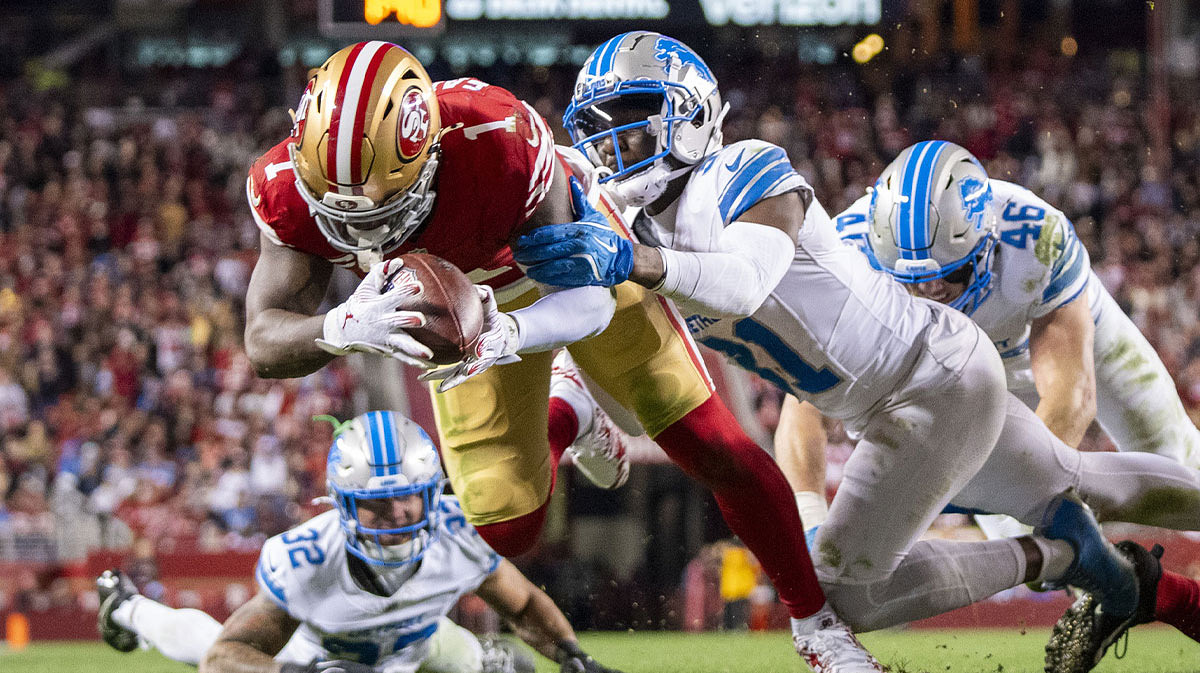 San Francisco 49ers wide receiver Deebo Samuel Sr. (1) scores a touchdown against Detroit Lions safety Kerby Joseph (31) during the third quarter at Levi's Stadium.