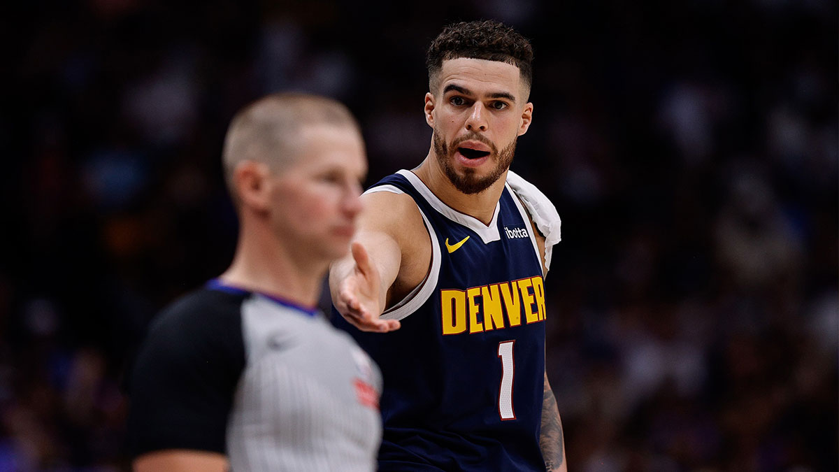 Denver Nuggets forward Michael Porter Jr. (1) gestures to referee Tyler Ford in the second quarter against the Oklahoma City Thunder during game four of the second round of the 2025 NBA Playoffs at Ball Arena.