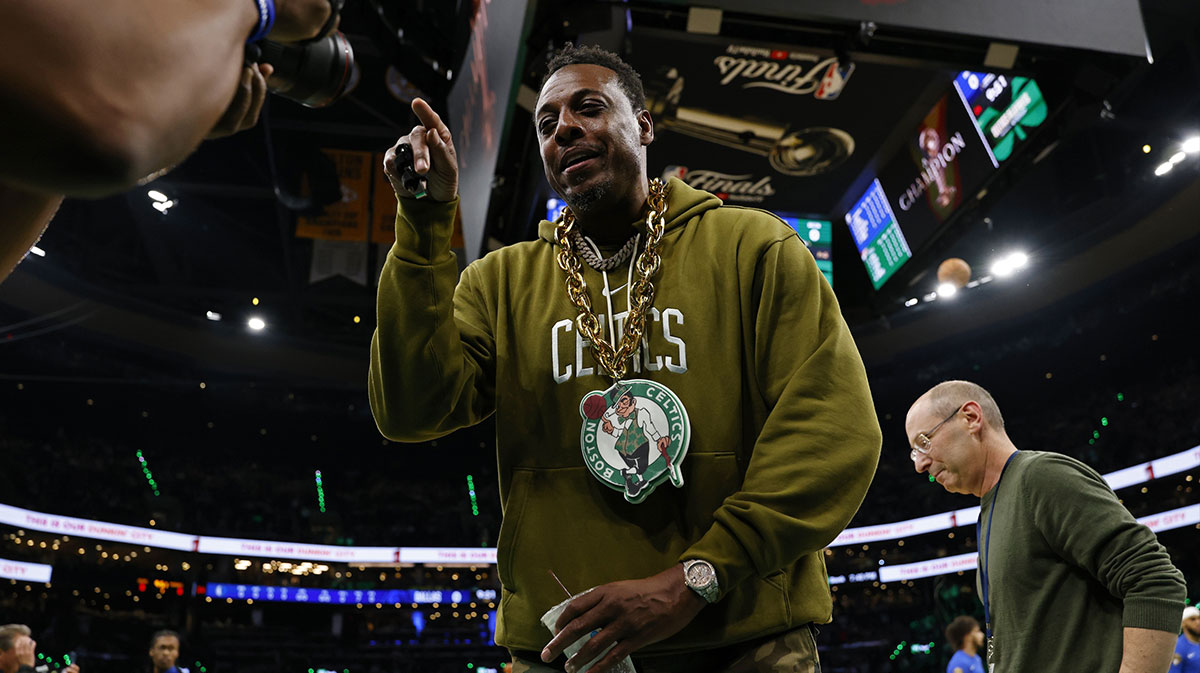 The former Boston Celtics player, Paul Pierce, consults a video camera on the field before the second match of the NBA 2024 final between the Boston Celtics and the Dallas Mavericks at TD Garden.