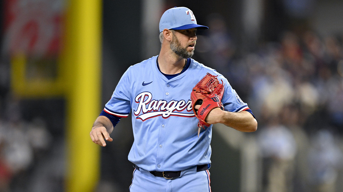 Texas Rangers relief pitcher Chris Martin (55) pitches against the Los Angeles Dodgers during the eighth inning at Globe Life Field.