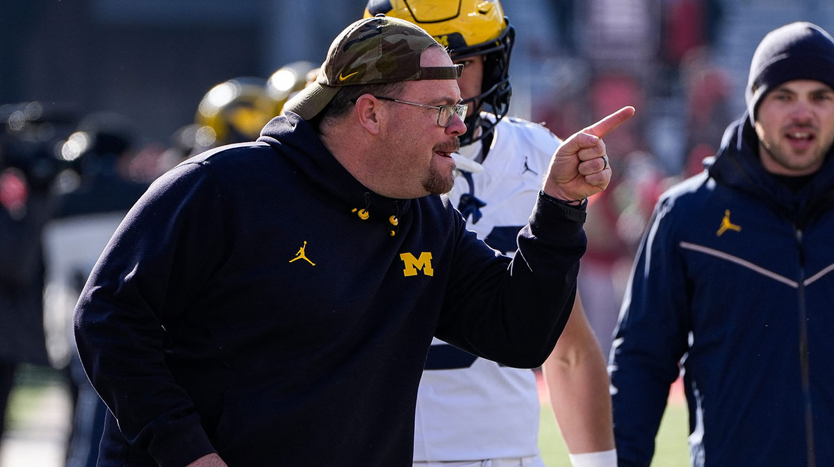 Michigan tight ends coach Steve Casula watches warm up before the game between Ohio State and Michigan at Ohio Stadium