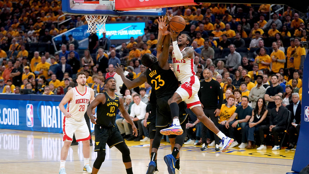 Houston Rockets guard Jalen Green (4) loses control of the ball next to Golden State Warriors forward Draymond Green (23) in the fourth quarter of game six of the first round for the 2025 NBA Playoffs at Chase Center.