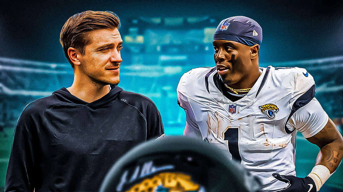 Jaguars GM James Gladstone and Jaguars RB Travis Eitenne