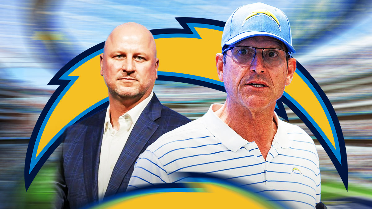 Chargers GM Joe Hortiz with Chargers HC Jim Harbaugh and Los Angeles Chargers logo behind them