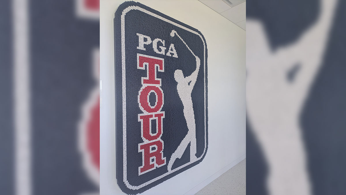 A giant PGA Tour logo made of an estimated 21,000 tees is on the wall inside the PGA Tour Studios building in Ponte Vedra Beach, Florida.