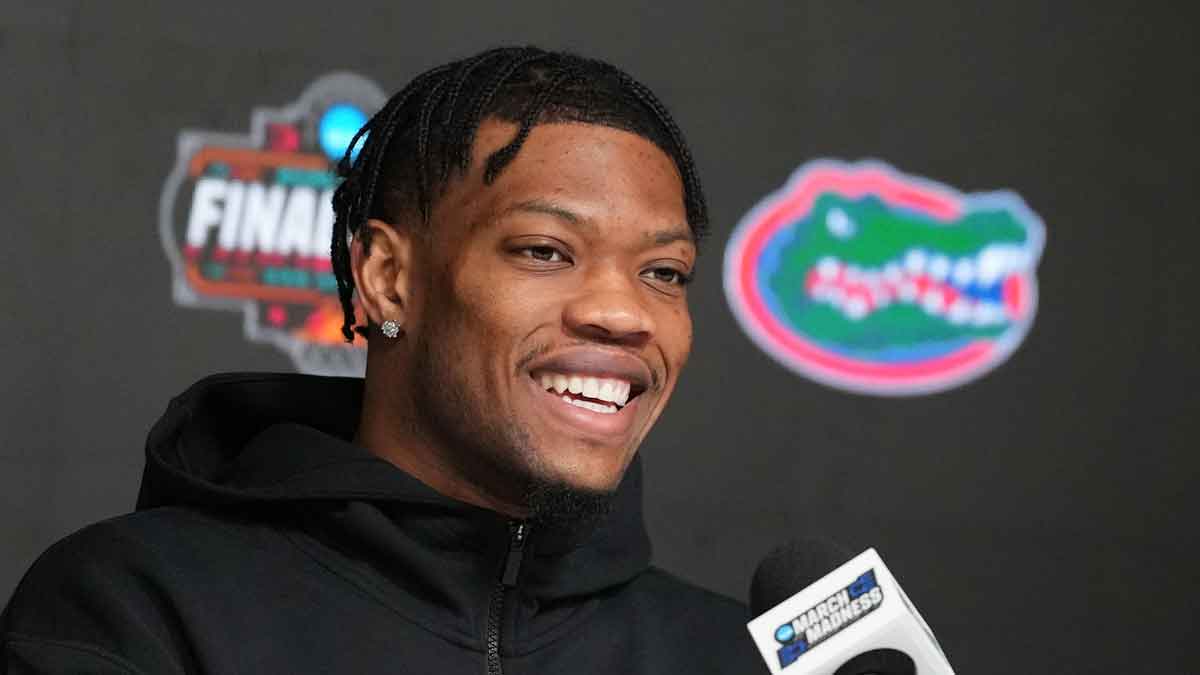 Florida Gators guard Alijah Martin (15) speaks to the media during a press conference for the men's 2025 NCAA tournament at Alamodome.