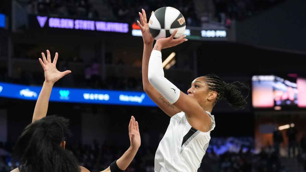 Las Vegas Aces center A'ja Wilson (right) shoots against Golden State Valkyries forward Monique Billings (25) during the third quarter at Chase Center.