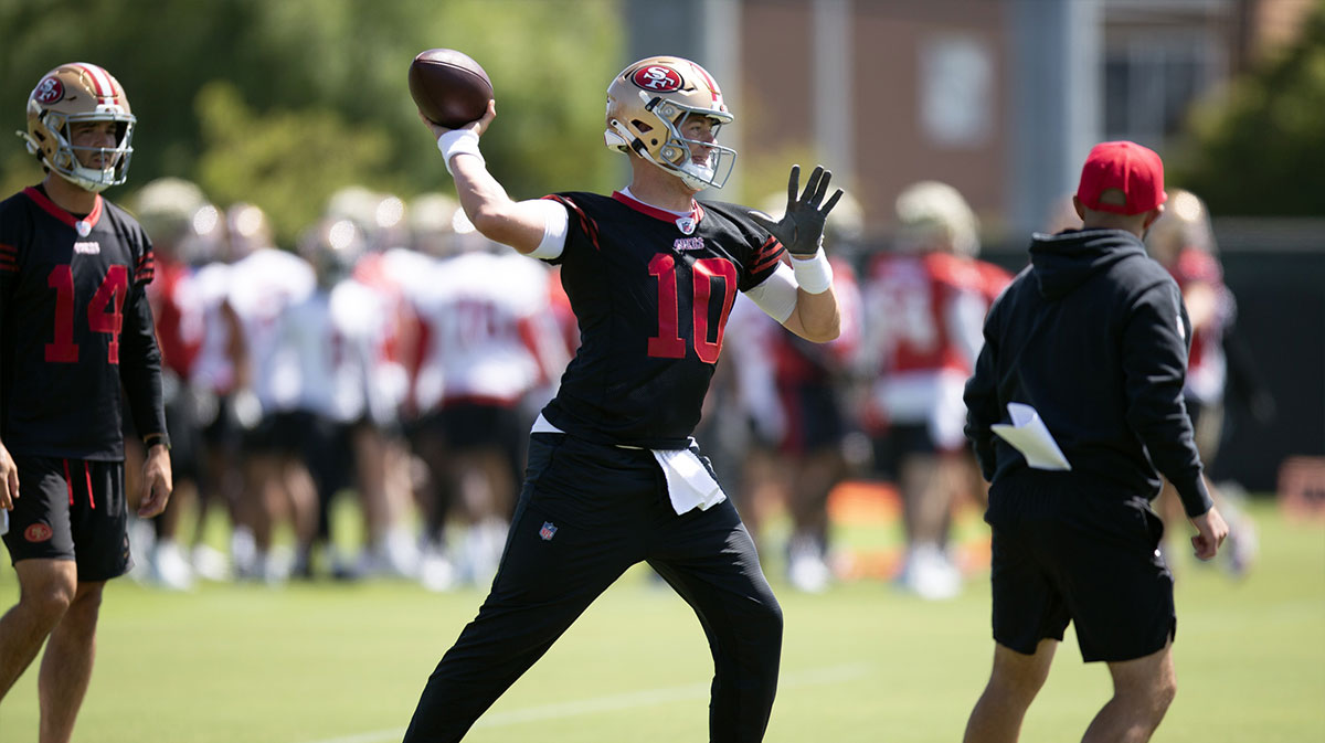 San Francisco 49ers quarterback Mac Jones (10) throws a pass during a team OTA at Levi's Stadium.