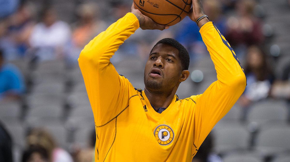 Indiana Pacers shooting guard Paul George (24) warms up before the game against the Dallas Mavericks at the American Airlines Center. The Pacers defeated the Mavericks 98-77. 