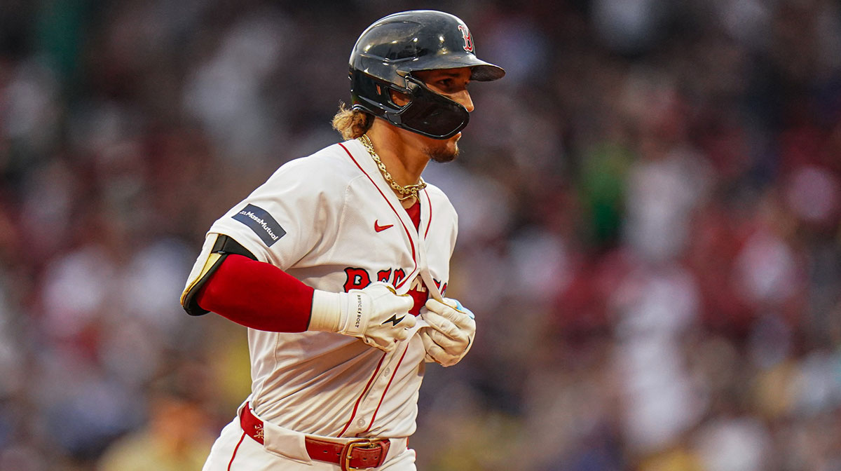 Boston Red Sox left fielder Jarren Duran (16) rounds the bases after hitting a home run against the San Diego Padres in the fifth inning at Fenway Park.