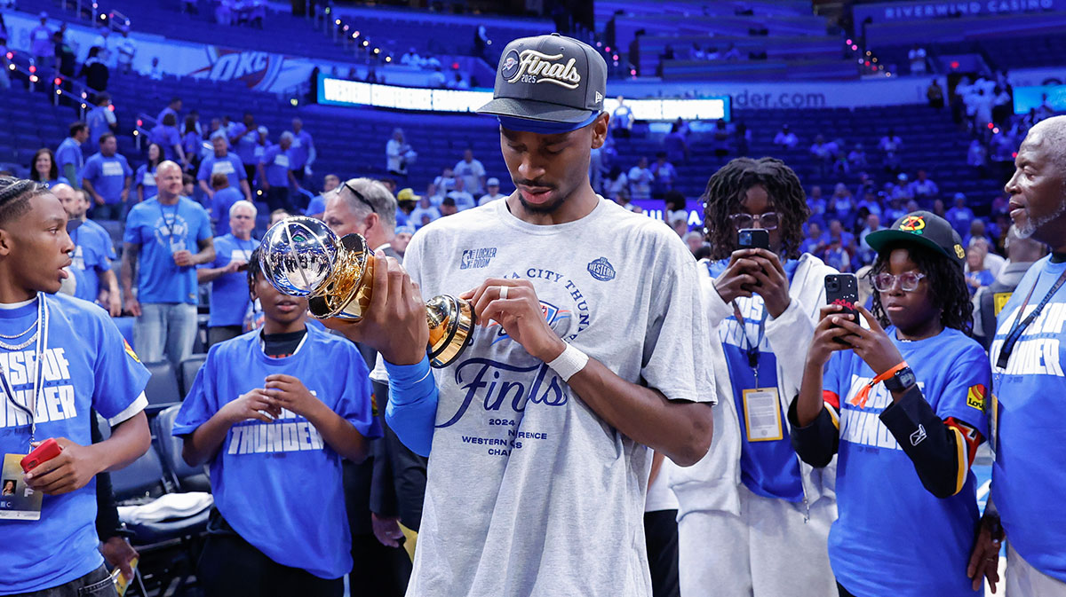 Oklahoma City Thunder guard Shai Gilgeous-Alexander (2) looks at his western conference finals MVP trophy after his team defeated the Minnesota Timberwolves in the western conference finals at Paycom Center. 