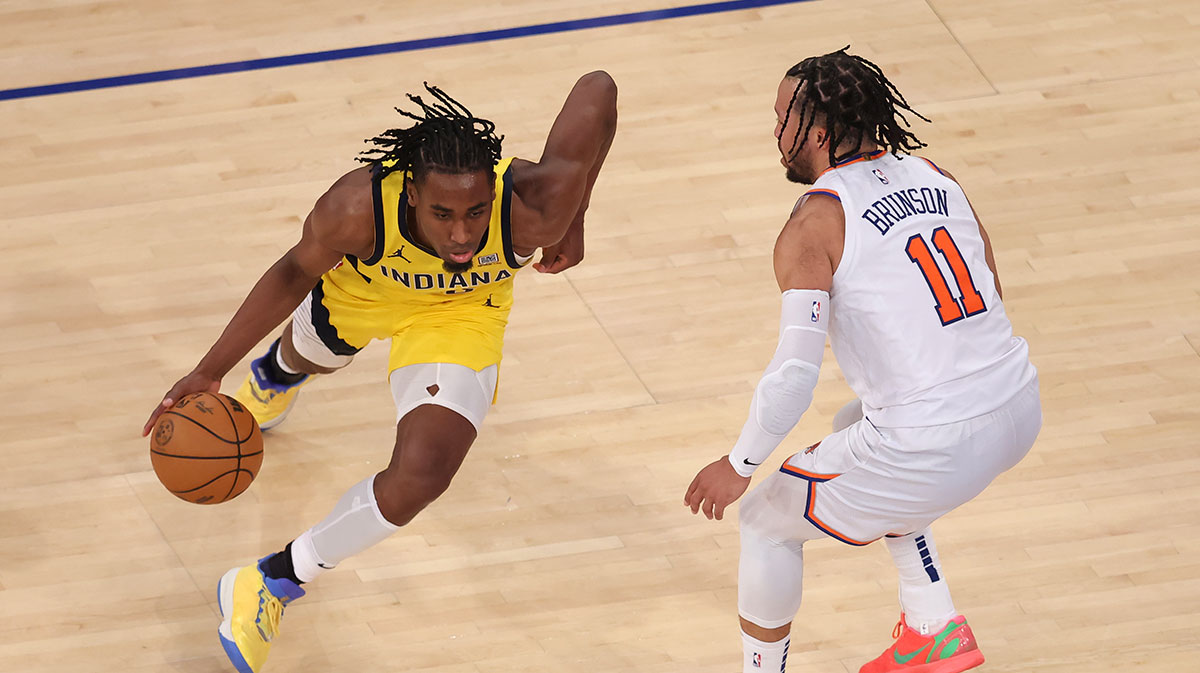 Indiana Pacers forward Aaron Nesmith (23) controls the ball against New York Knicks guard Jalen Brunson (11) in the third quarter during game five of the eastern conference finals for the 2025 NBA Playoffs at Madison Square Garden. 