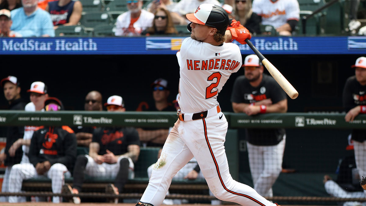 Baltimore Orioles shortstop Gunnar Henderson (2) hits a single during the first inning against the Chicago White Sox at Oriole Park at Camden Yards.