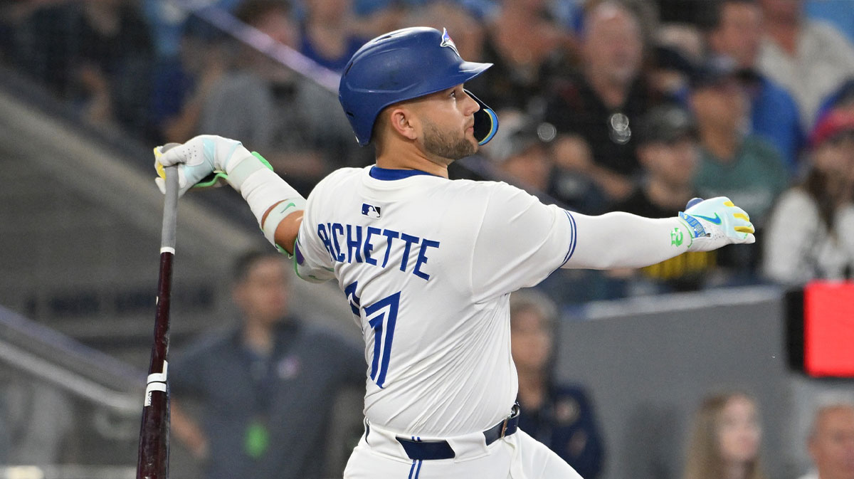 Toronto Blue Jays shortstop Bo Bichette (11) hits a double against the Philadelphia Phillies in the sixth inning at Rogers Centre.