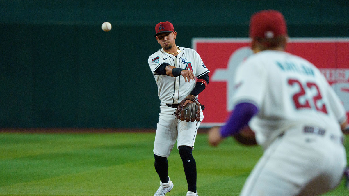 Arizona Diamondbacks infielder Ildemaro Vargas (6) reacts after throwing to first baseman Josh Naylor (22) to make the out in the fourth inning against the Washington Nationals at Chase Field.