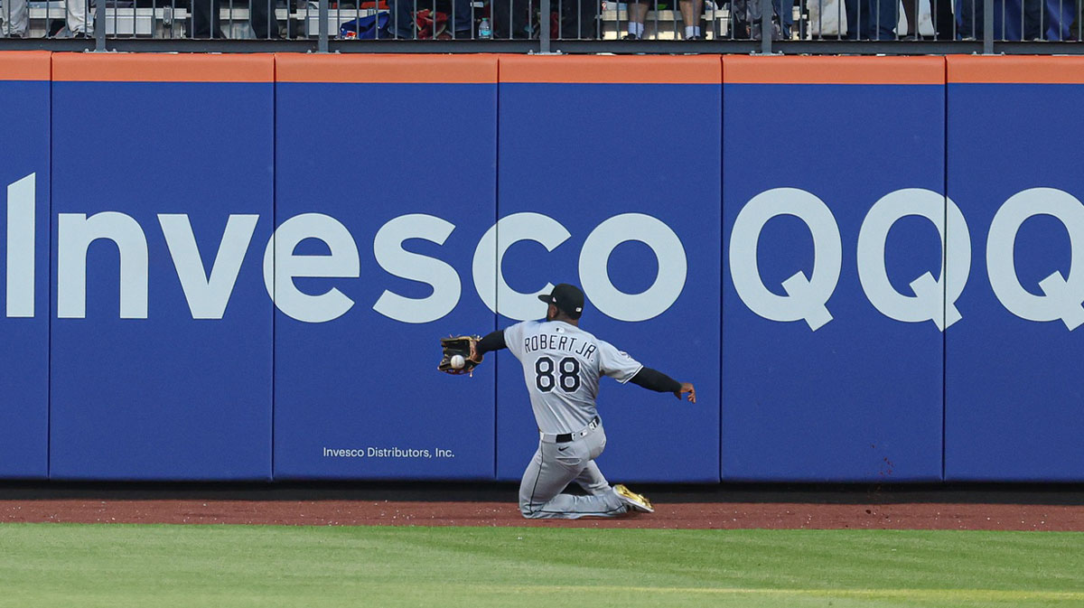 Chicago White Sox center fielder Luis Robert Jr. (88) can not secure a ball hit by New York Mets center fielder Tyrone Taylor (not pictured) during the ninth inning at Citi Field.