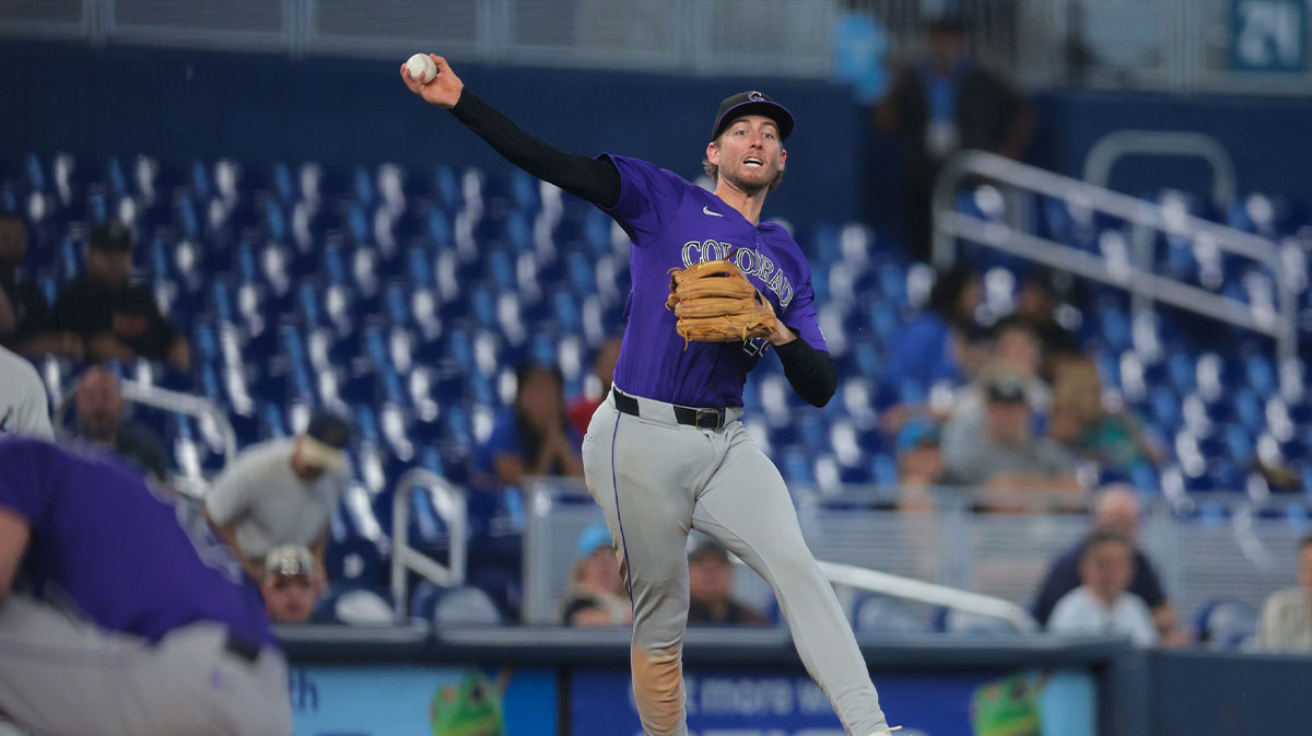 Colorado Rockies third baseman Ryan McMahon (24) throws to first base to retire Miami Marlins second baseman Jack Winkler (not pictured) during the sixth inning at loanDepot Park.