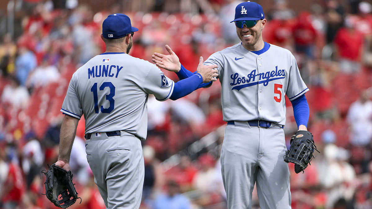 Los Angeles Dodgers first baseman Freddie Freeman (5) celebrates with third baseman Max Muncy (13) after the Dodgers defeated the St. Louis Cardinals at Busch Stadium. MLB trade deadline