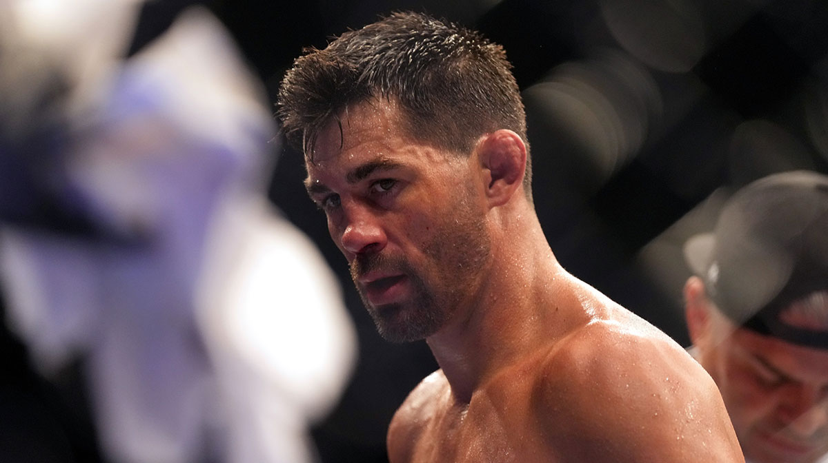 Dominick Cruz (blue gloves) reacts after losing to Marlon Vera (not pictured) during UFC Fight Night at Pechanga Arena.