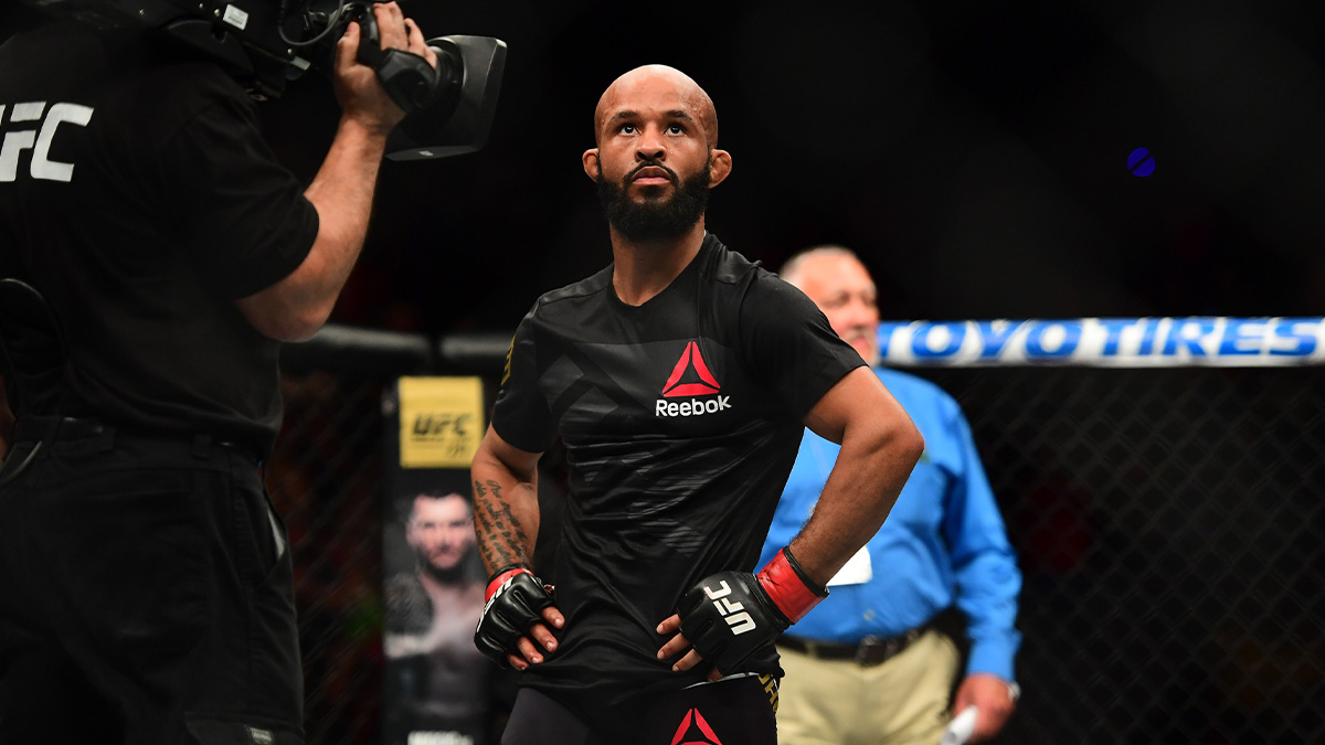 Demetrious Johnson (red) following the win over and Wilson Reis (not pictured) during UFC Fight Night at Sprint Center.