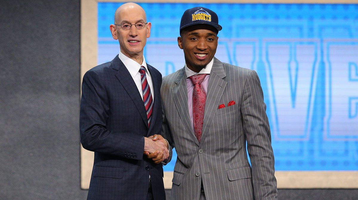 Donovan Mitchell (Louisville) is introduced by NBA commissioner Adam Silver as the number thirteen overall pick to the Denver Nuggets in the first round of the 2017 NBA Draft at Barclays Center.