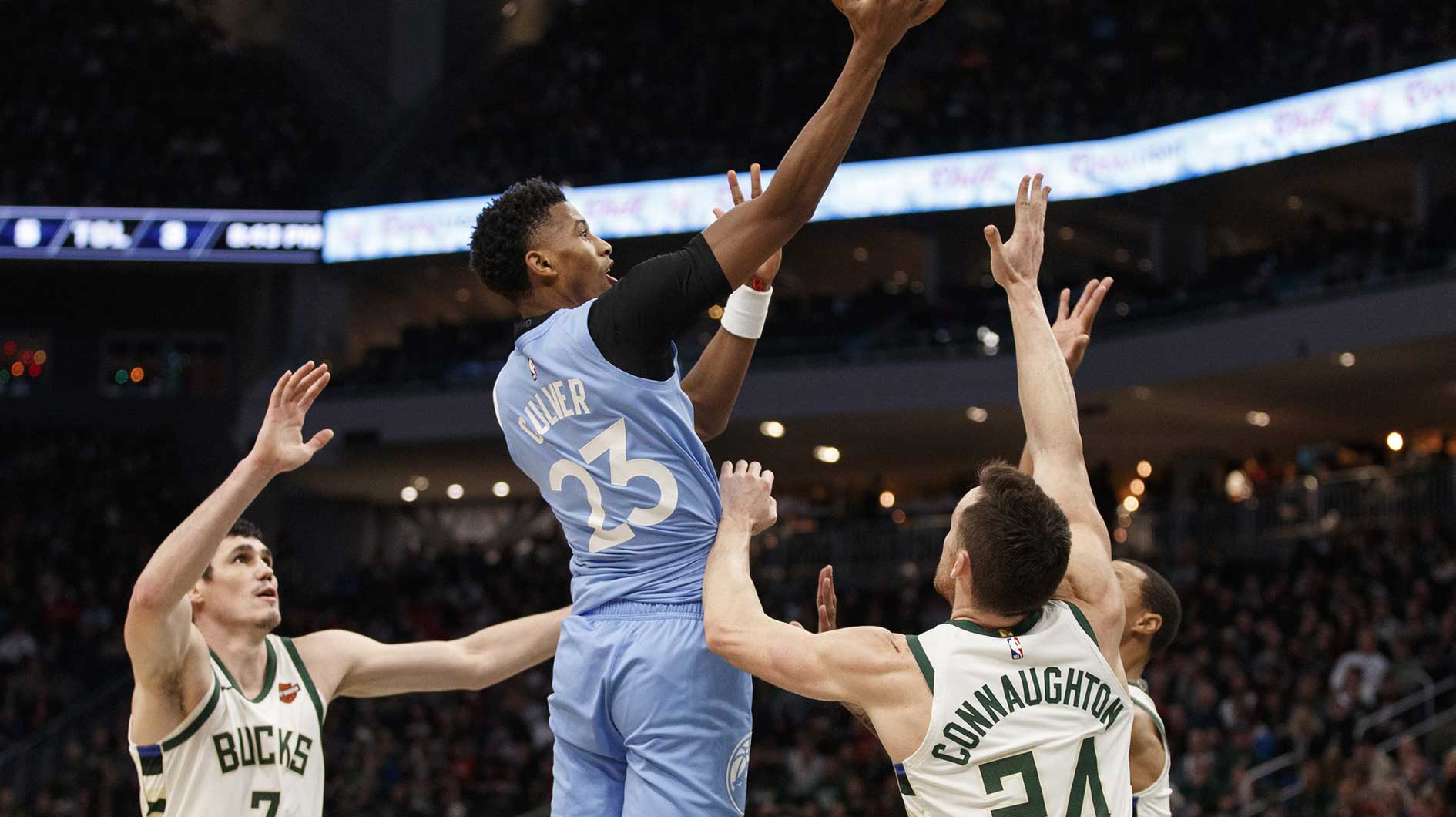Minnesota Timberwolves guard Jarrett Culver (23) shoots over Milwaukee Bucks guard Pat Connaughton (24) during the third quarter at Fiserv Forum.