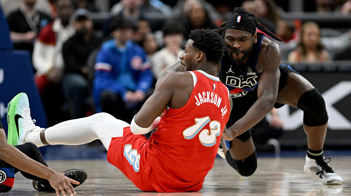 Memphis Grizzlies forward Jaren Jackson Jr. (13) and Detroit Pistons center Isaiah Stewart (28) battle for a loose ball in the second quarter at Little Caesars Arena.