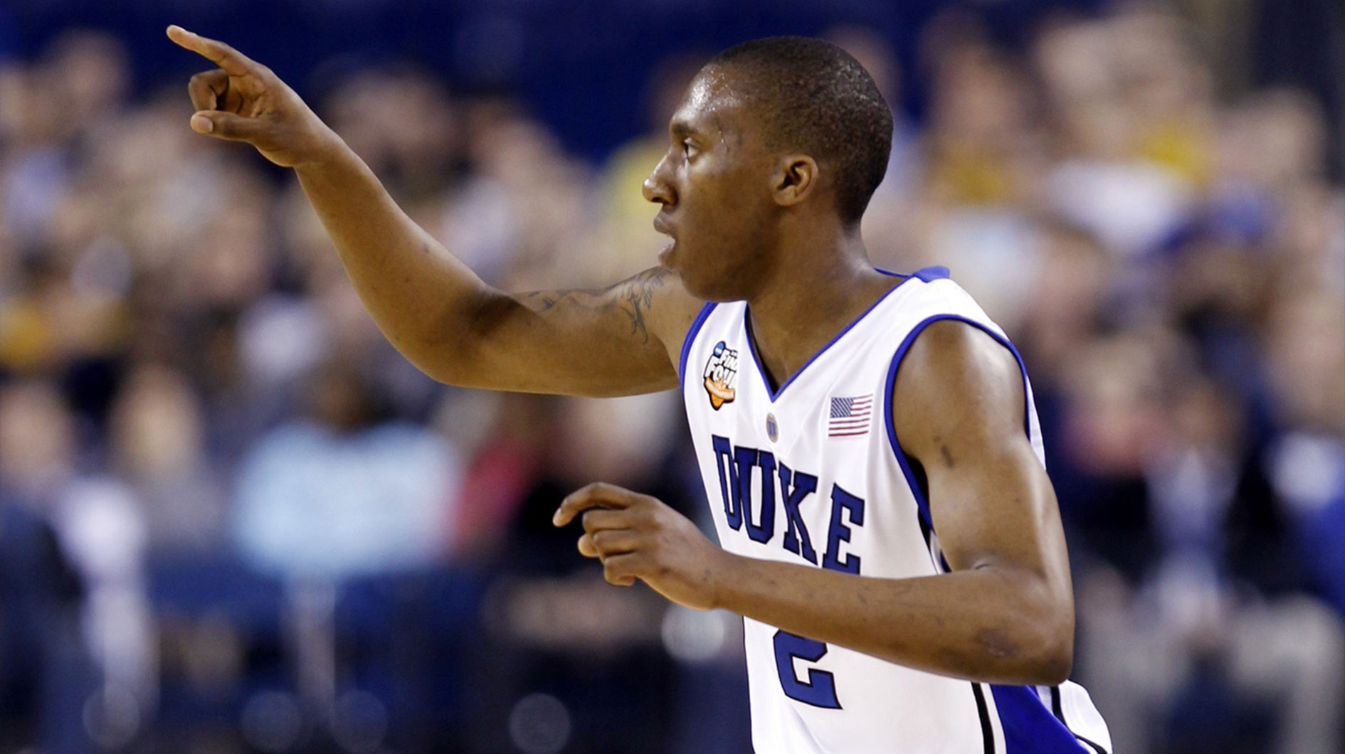 Duke Blue Devils guard Nolan Smith (2) celebrates after making a three point basket during the first half of the semifinals of the Final Four of the 2010 NCAA mens basketball tournament against the West Virginia Mountaineers at Lucas Oil Stadium.
