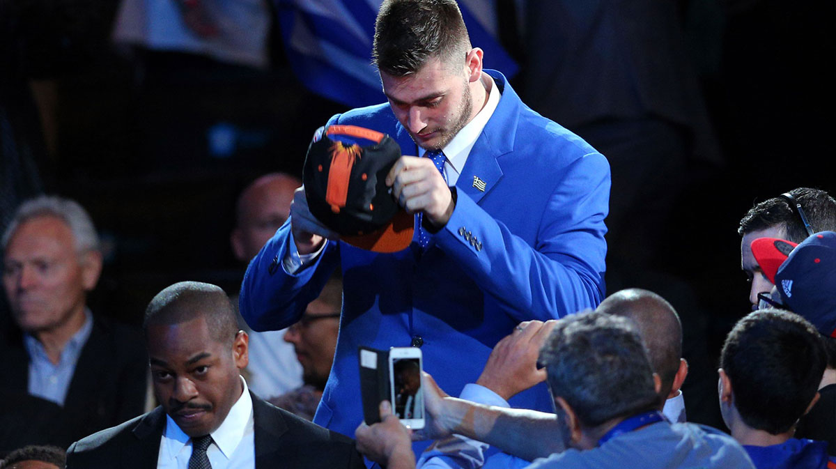 Georgios Papagiannis walks to the stage after being selected as the number thirteen overall pick to the Phoenix Suns in the first round of the 2016 NBA Draft at Barclays Center.