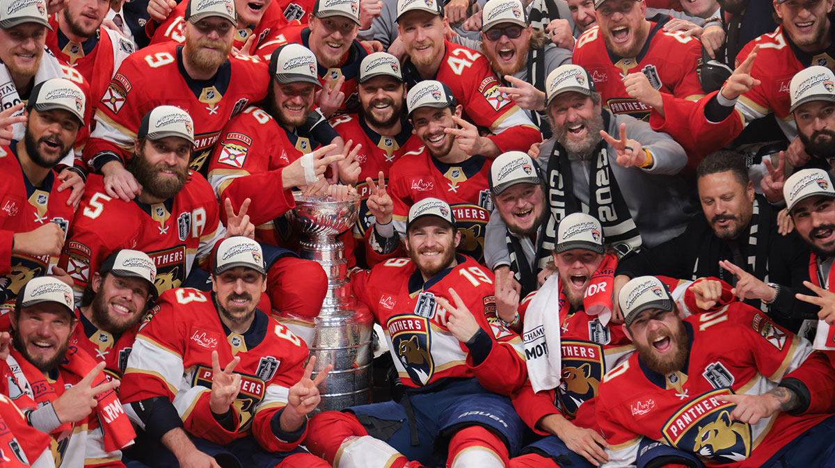 The Florida Panthers pose for a photo with the Stanley Cup after winning game six of the 2025 Stanley Cup Final against the Edmonton Oilers at Amerant Bank Arena.