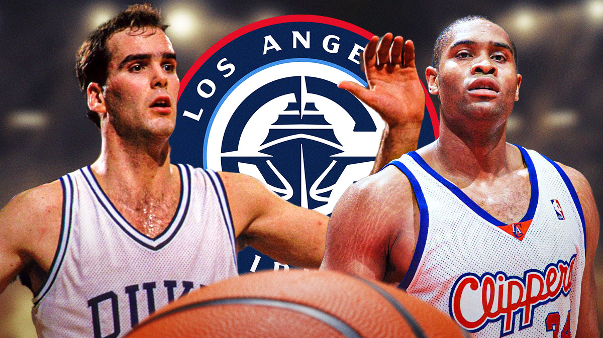 Michael Olowokandi (Clippers) and Danny Ferry (Duke) together. Clippers logo front and center.
