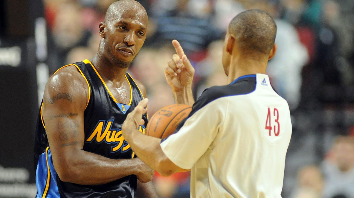 Denver Nuggets guard Chauncey Billups (1) has some words with official Dan Crawford in the third quarter of the game against the Portland Trailblazers at the Rose Garden. The Nuggets won the game 97-94.