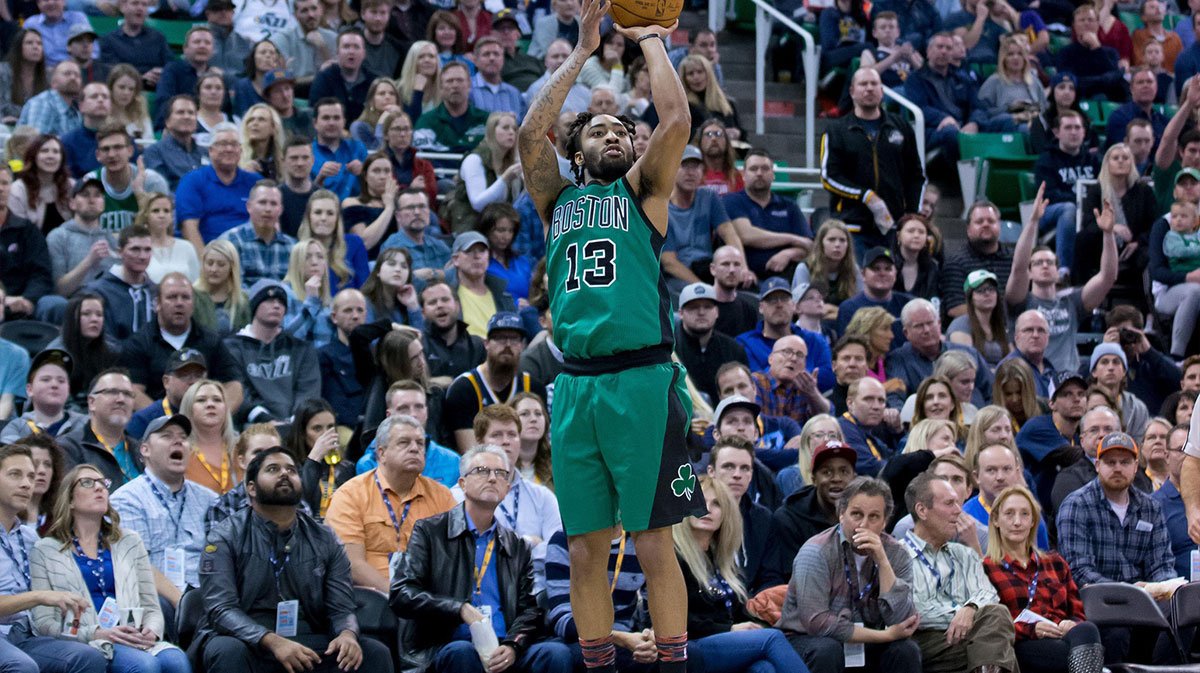 Boston Celtics guard James Young (13) shoots the ball during the second half against the Utah Jazz at Vivint Smart Home Arena. Boston won 112-104.