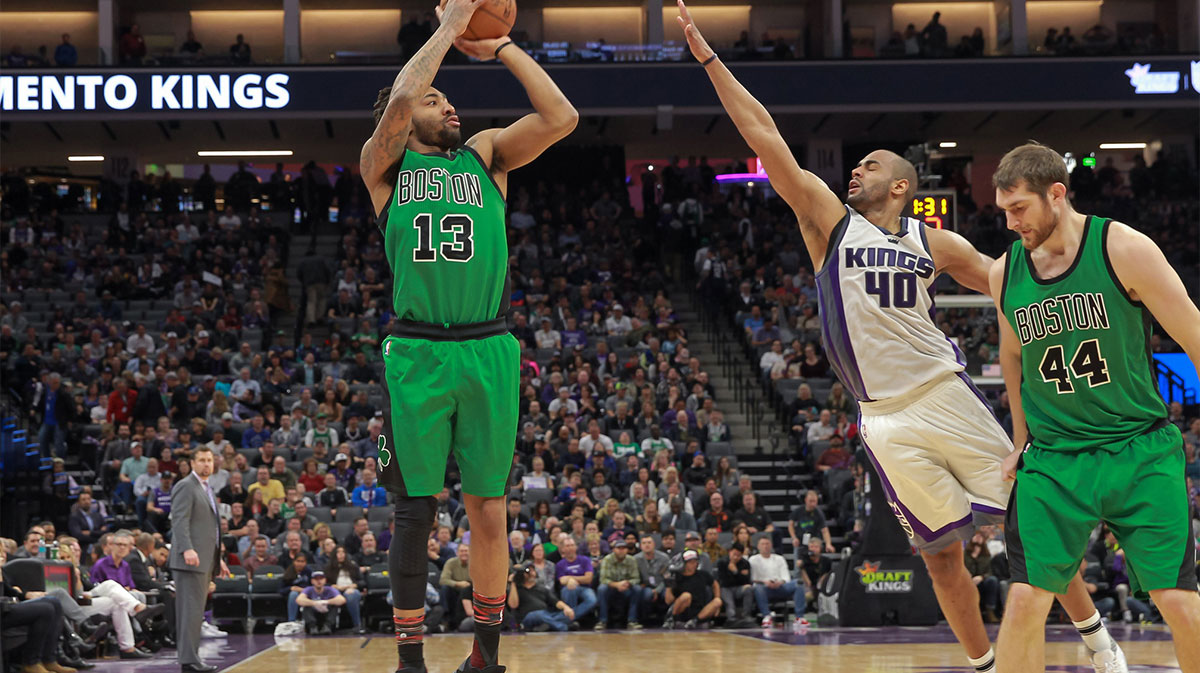 Boston Celtics guard James Young (13) shoots the ball over Sacramento Kings guard Arron Afflalo (40) during the fourth quarter at Golden 1 Center. The Kings defeated the Celtics 108-92.
