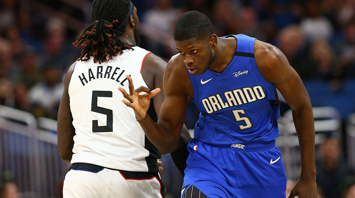 Orlando Magic center Mo Bamba (5) celebrates as he makes a three point basket against the LA Clippers during the first half at Amway Center.