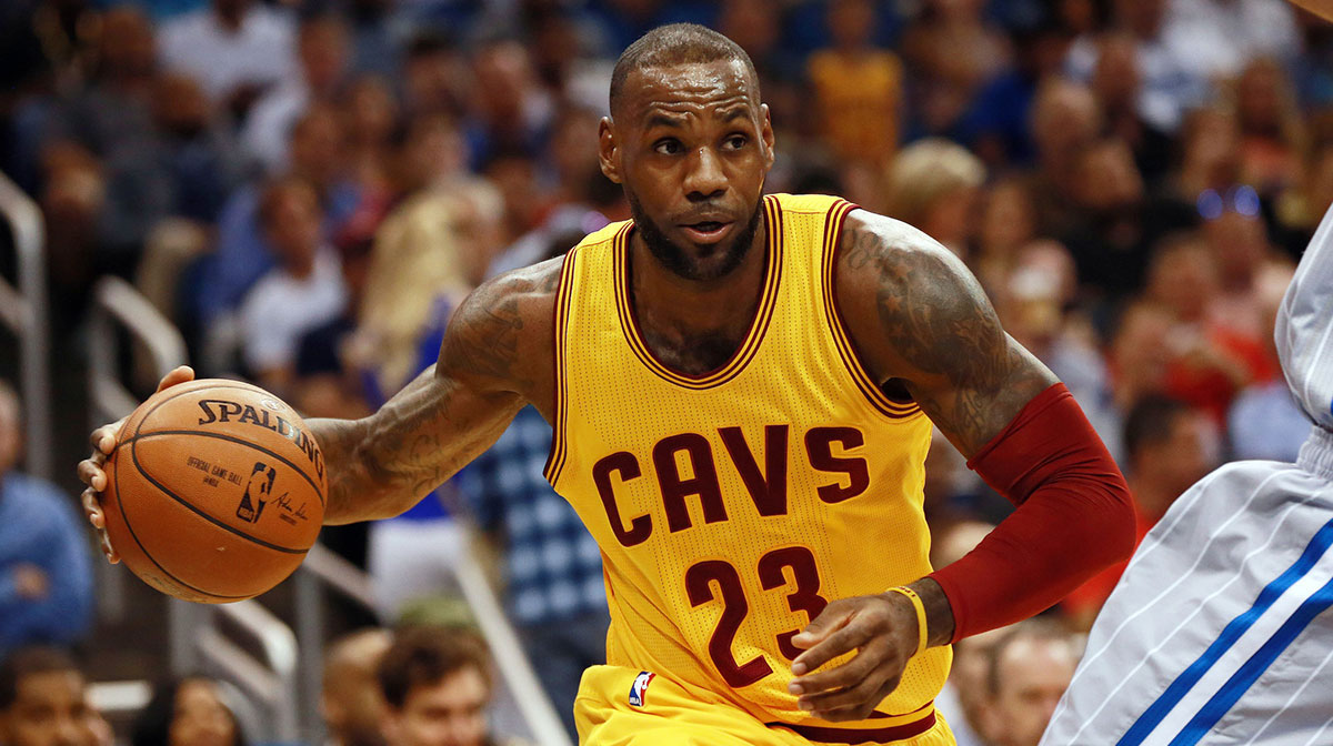 Cleveland Cavaliers forward LeBron James (23) drives to the basket against the Orlando Magic during the first quarter at Amway Center.