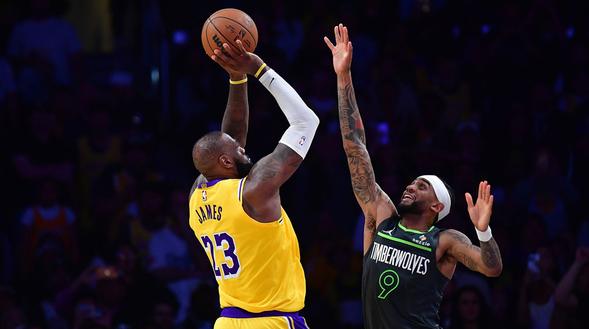 Los Angeles Lakers forward LeBron James (23) shoots against Minnesota Timberwolves guard Nickeil Alexander-Walker (9) during the second half in game five of first round for the 2025 NBA Playoffs at Crypto.com Arena.