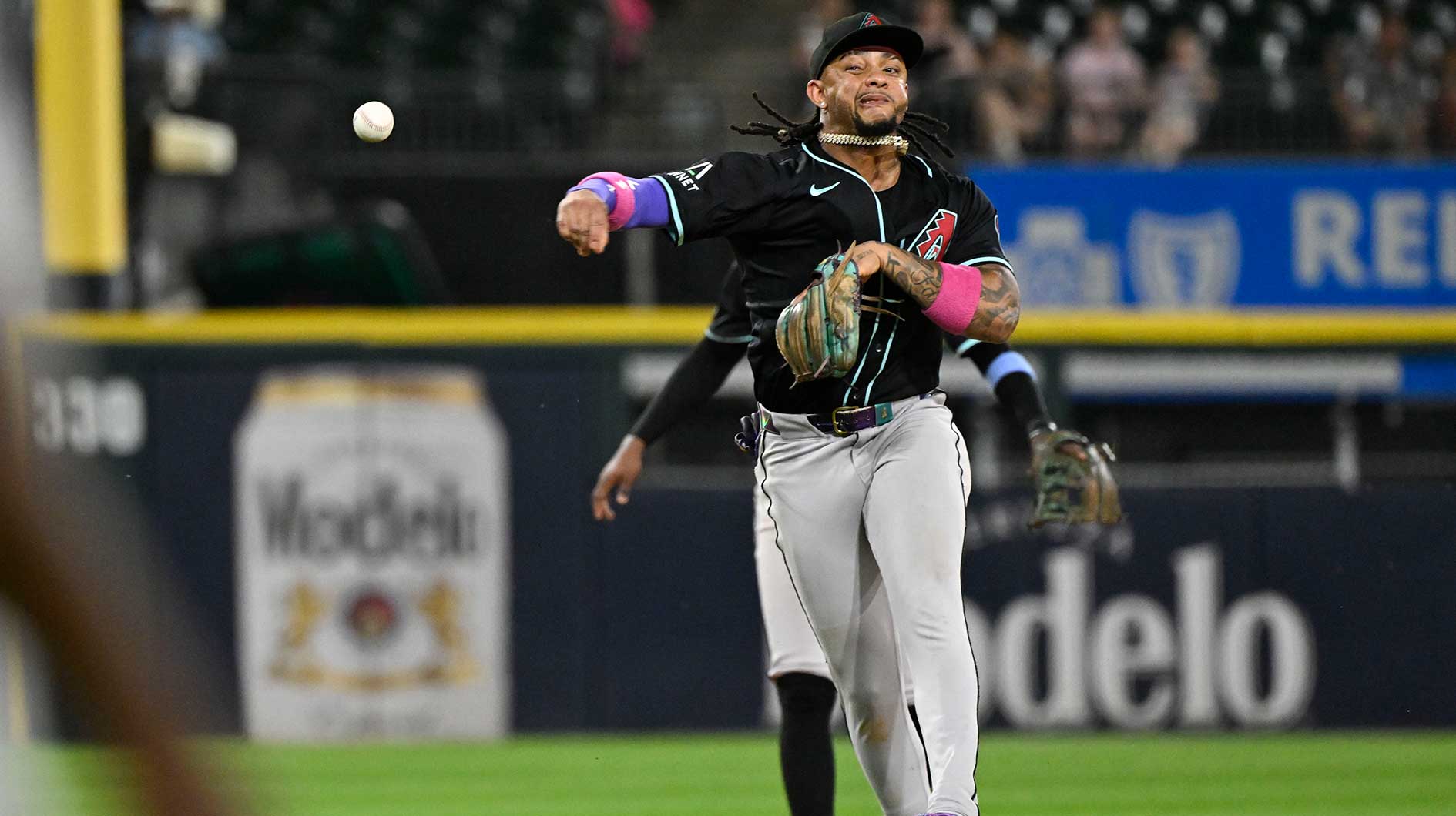 Jun 23, 2025; Chicago, Illinois, USA; Arizona Diamondbacks second baseman Ketel Marte (4) tries to throw out Chicago White Sox outfielder Luis Robert Jr. (88) at first base during the ninth inning at Rate Field. Mandatory Credit: Matt Marton-Imagn Images