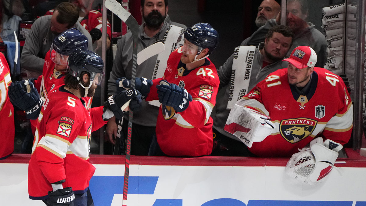 Florida Panthers defenseman Aaron Ekblad (5) celebrates scoring with the bench during the third period against the Edmonton Oilers in game three of the 2025 Stanley Cup Final at Amerant Bank Arena.