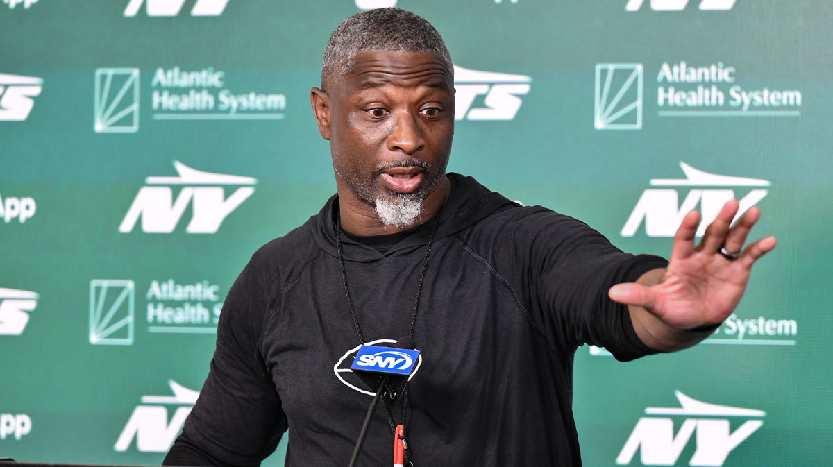 Jun 10, 2025; East Rutherford, NJ, USA; New York Jets head coach Aaron Glenn speaks at a press conference during minicamp at Atlantic Health Jets Training Center. Mandatory Credit: John Jones-Imagn Images. Jets hot takes include Justin Fields and Josh Reynolds.