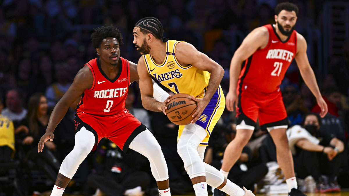 Houston Rockets guard Aaron Holiday (0) defends against Los Angeles Lakers guard Gabe Vincent (7) during the second half at Crypto.com Arena. Mandatory Credit: Jonathan Hui-Imagn Images