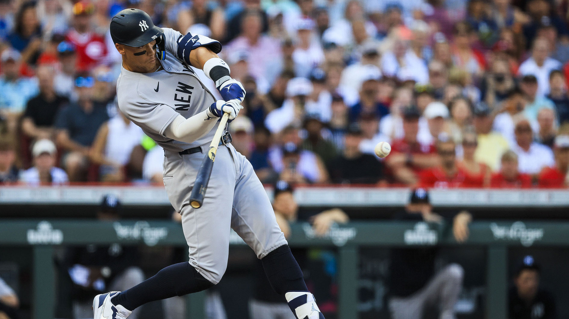 Jun 23, 2025; Cincinnati, Ohio, USA; New York Yankees outfielder Aaron Judge (99) hits a solo home run in the first inning against the Cincinnati Reds at Great American Ball Park.