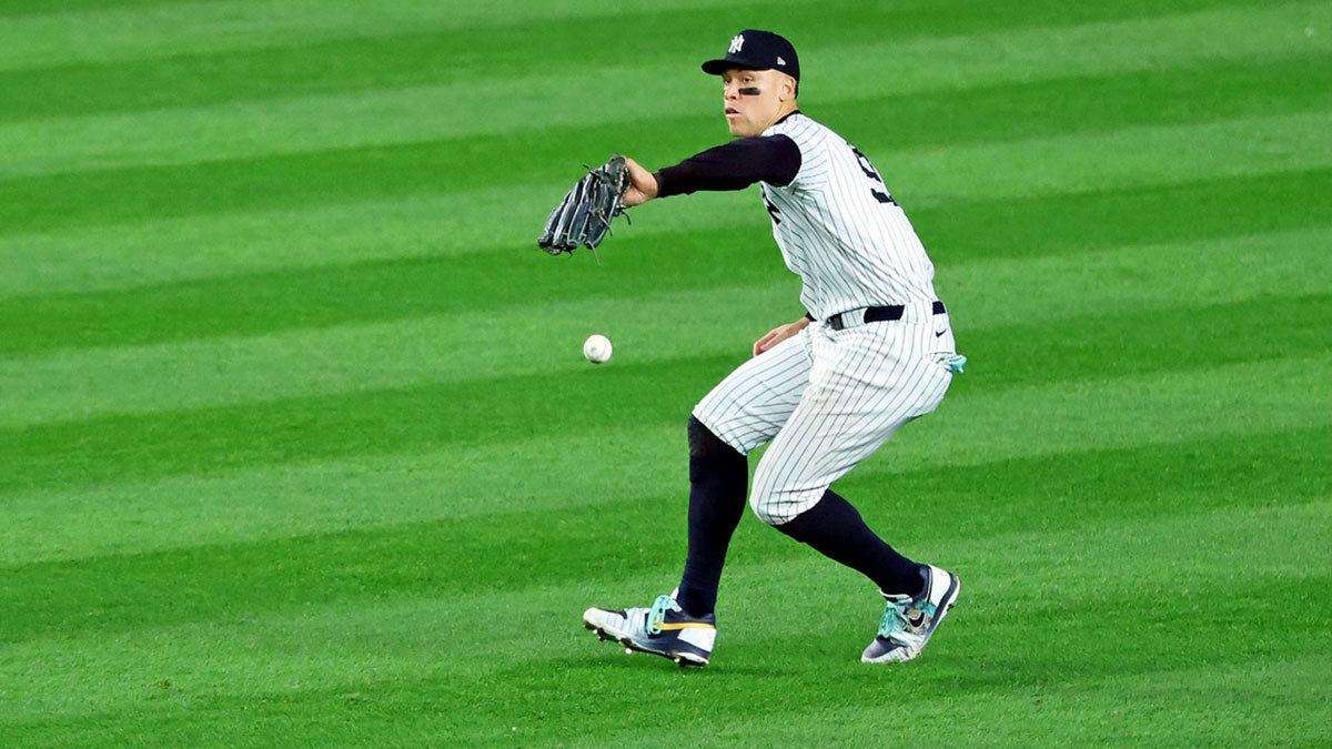 New York Yankees outfielder Aaron Judge (99) drops a fly ball during the fifth inning against the Los Angeles Dodgers during game five of the 2024 MLB World Series at Yankee Stadium. 