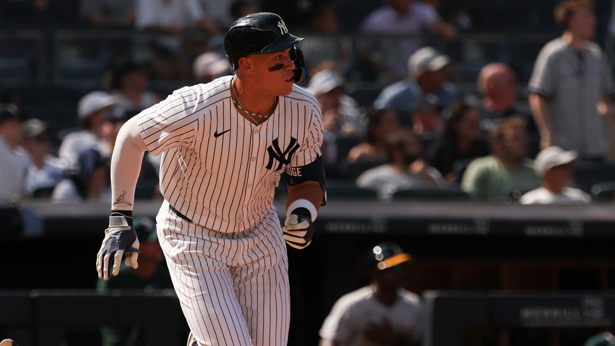 New York Yankees designated hitter Aaron Judge (99) hits a two run home run during the seventh inning against the Athletics at Yankee Stadium.