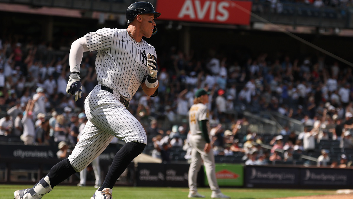 New York Yankees designated hitter Aaron Judge (99) hits a two run home run during the seventh inning against Athletics pitcher Tyler Ferguson (44) at Yankee Stadium.