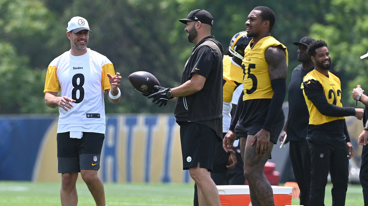 Pittsburgh Steelers quarterback Aaron Rodgers (8) gets the ball during minicamp.