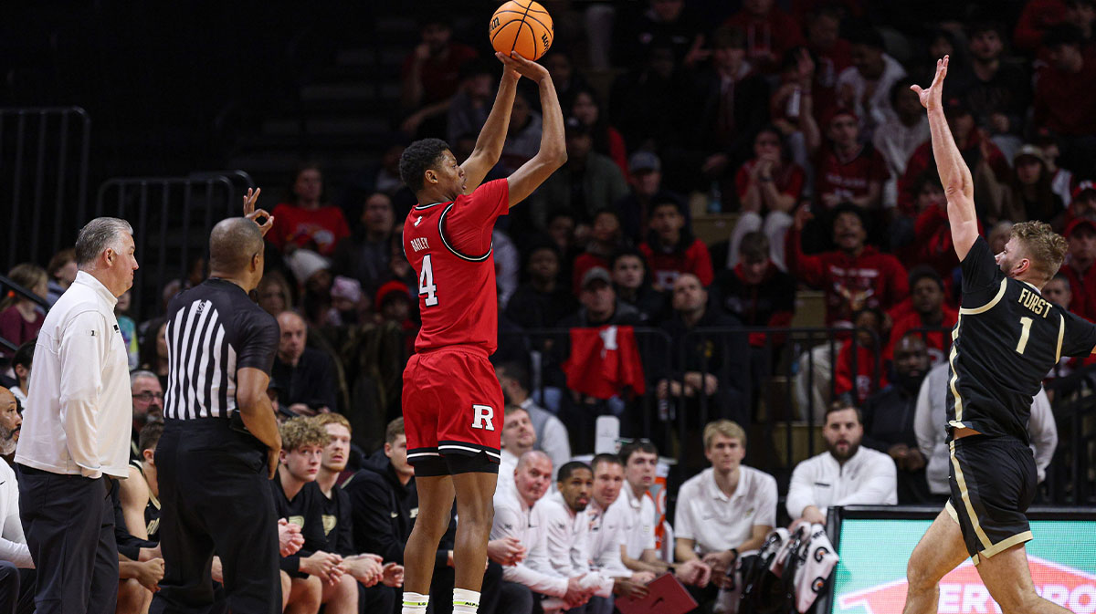 Rutgers Scarlet Knights guard Ace Bailey (4) shoots the ball as Purdue Boilermakers forward Caleb Furst (1) defends during the first half at Jersey Mike's Arena.