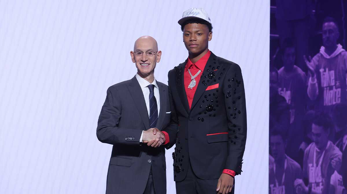 Ace Bailey stands with NBA commissioner Adam Silver after being selected as the fifth pick by the Utah Jazz in the first round of the 2025 NBA Draft at Barclays Center.