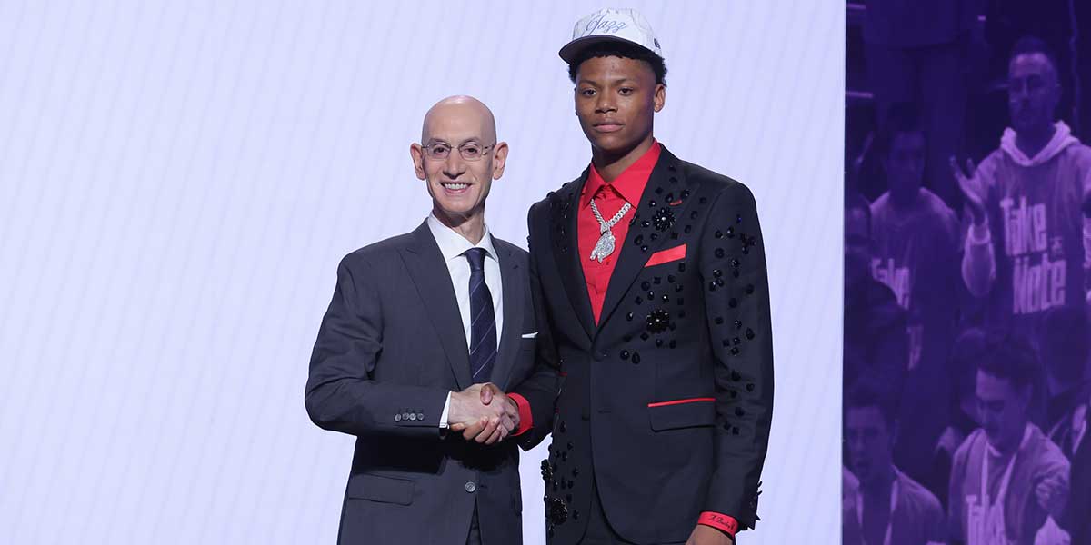 Ace Bailey stands with NBA commissioner Adam Silver after being selected as the fifth pick by the Utah Jazz in the first round of the 2025 NBA Draft at Barclays Center.