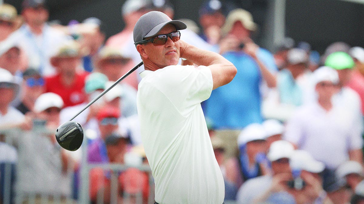 Adam Scott plays his shot from the third tee during the final round of the U.S. Open golf tournament.